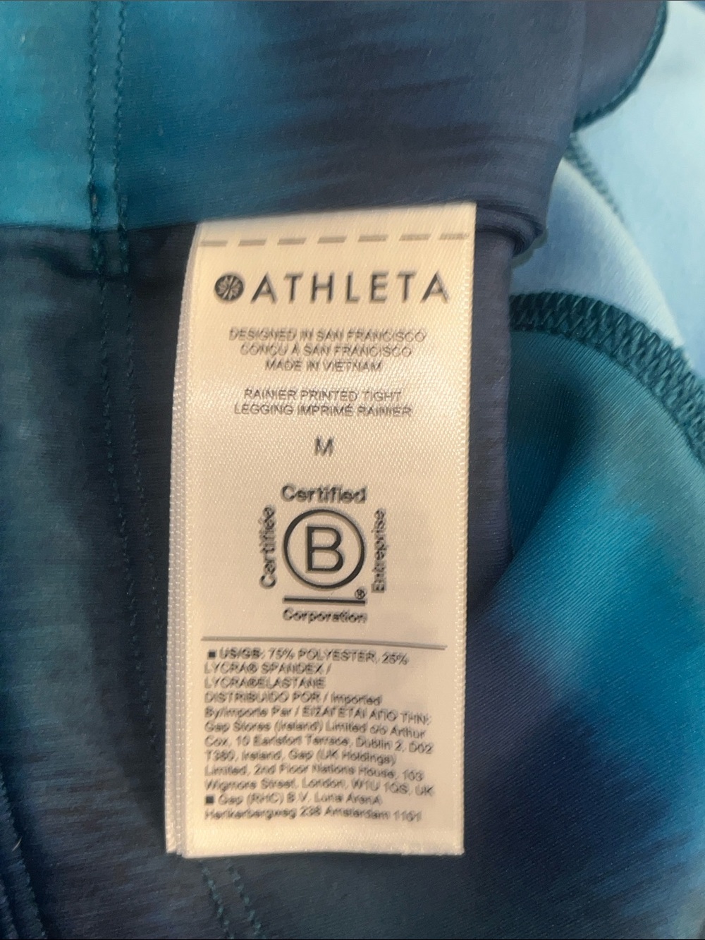 Athleta Rainier Reflective Printed Tight in Blue/Teal Watercolor Swirl - Picture 6 of 7